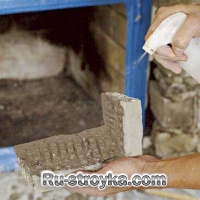 Как декорировать камин при помощи искусственного камня.