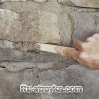 Как декорировать камин при помощи искусственного камня.