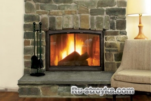Как декорировать камин при помощи искусственного камня.