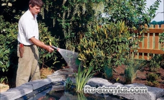 Изготовление декоративного пруда из природного камня.